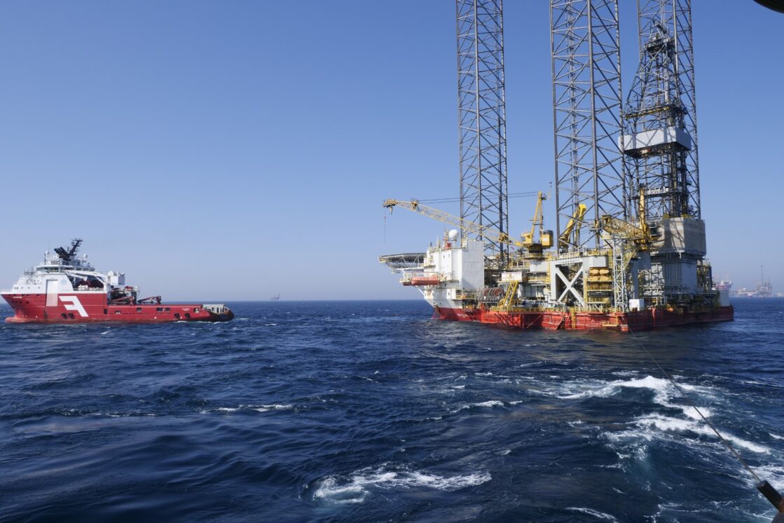 Oil & Gas Law Firm in India - Energy Sector Legal Experts Oil and Natural Gas Law - Energy sector with oil rigs and gas infrastructure
